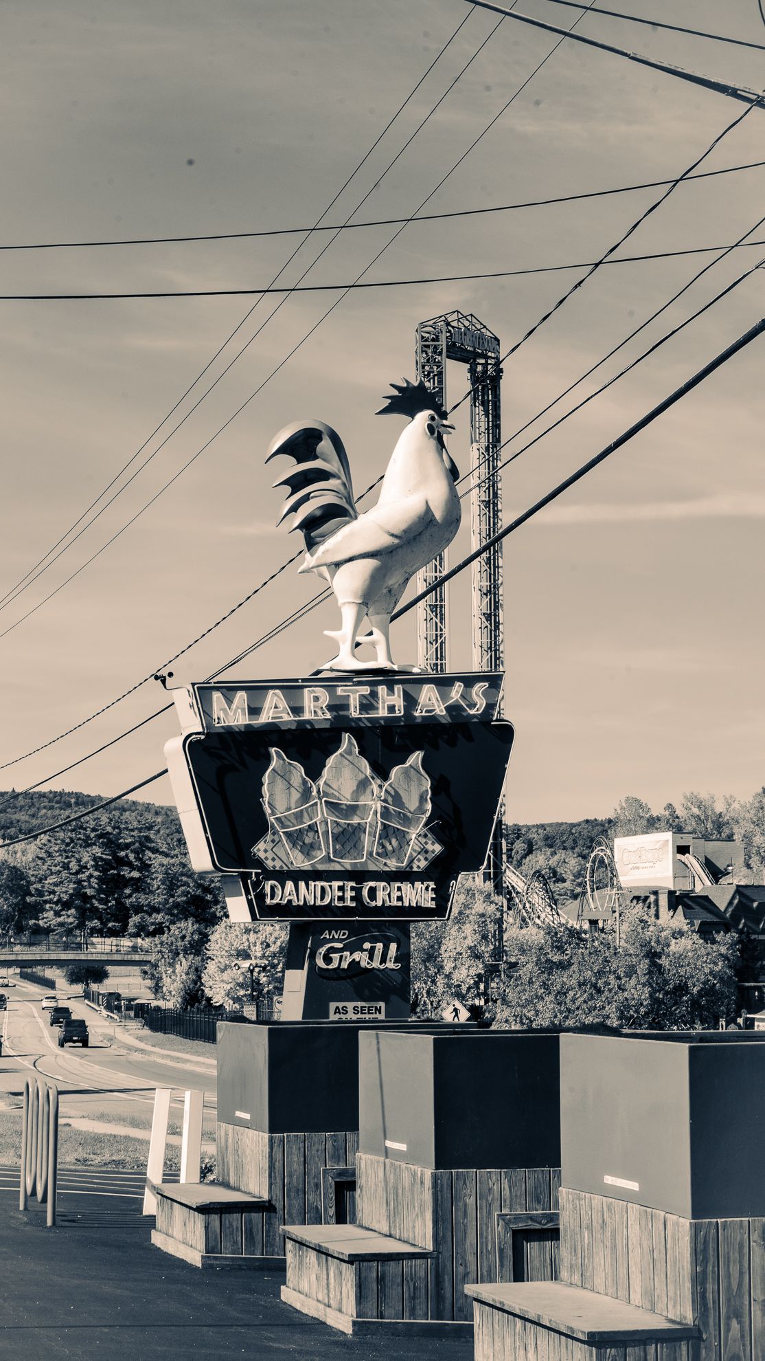 The rooster sign at Martha's Dandee Creme, sepia